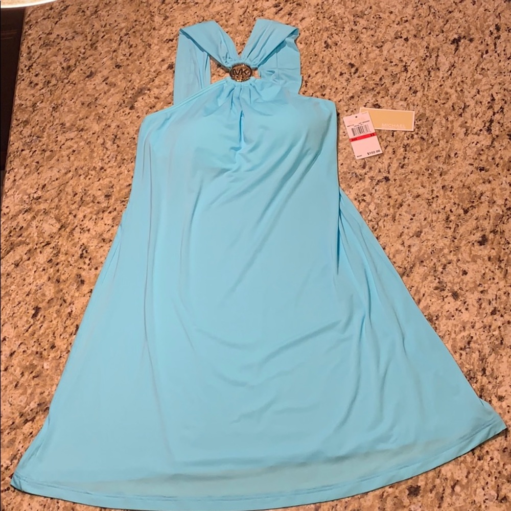 Woman’s Michael Kors swimsuit cover